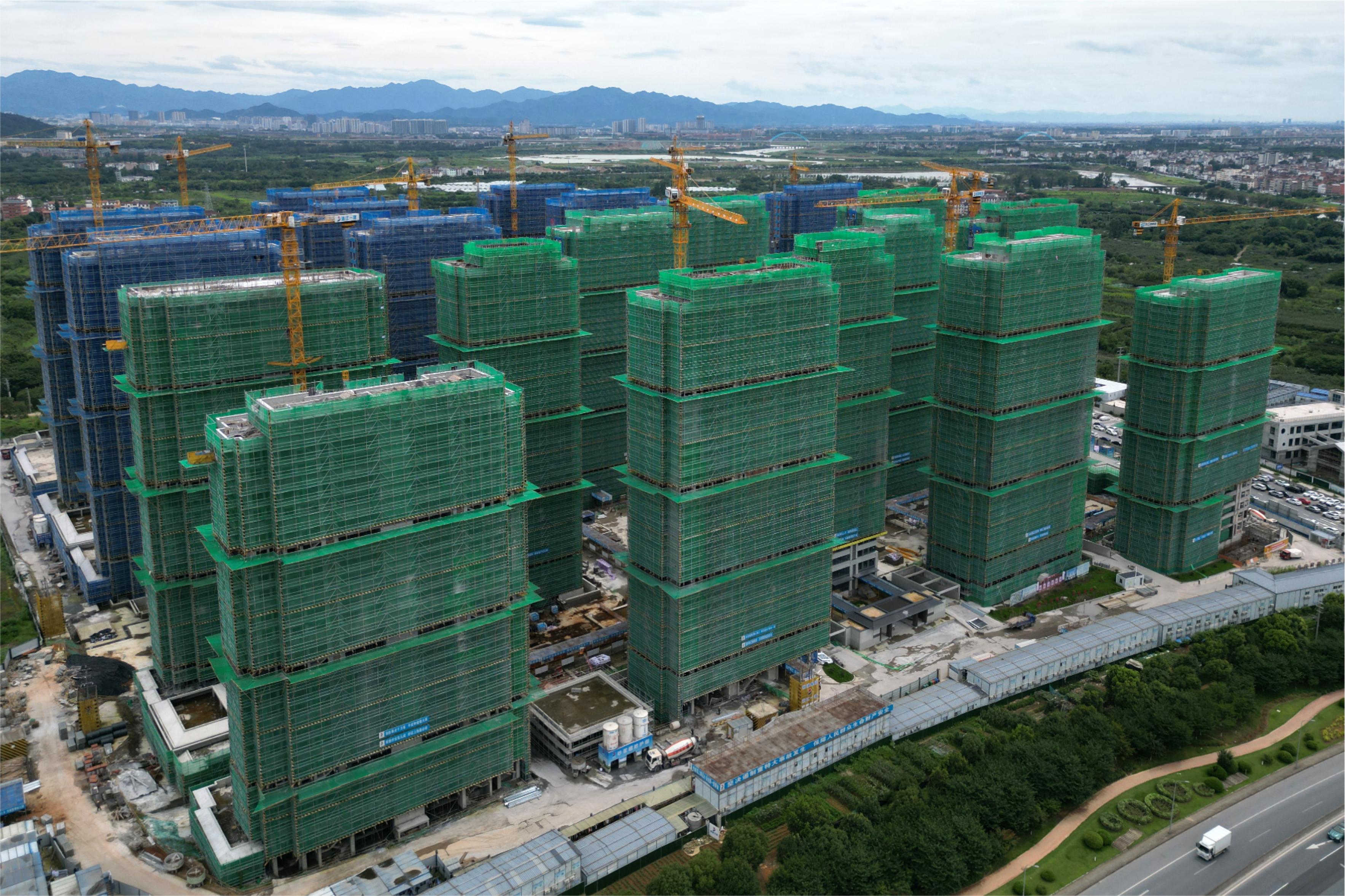 浙江一建，浙江一建義烏毛店安置房項(xiàng)目順利結(jié)頂.jpg